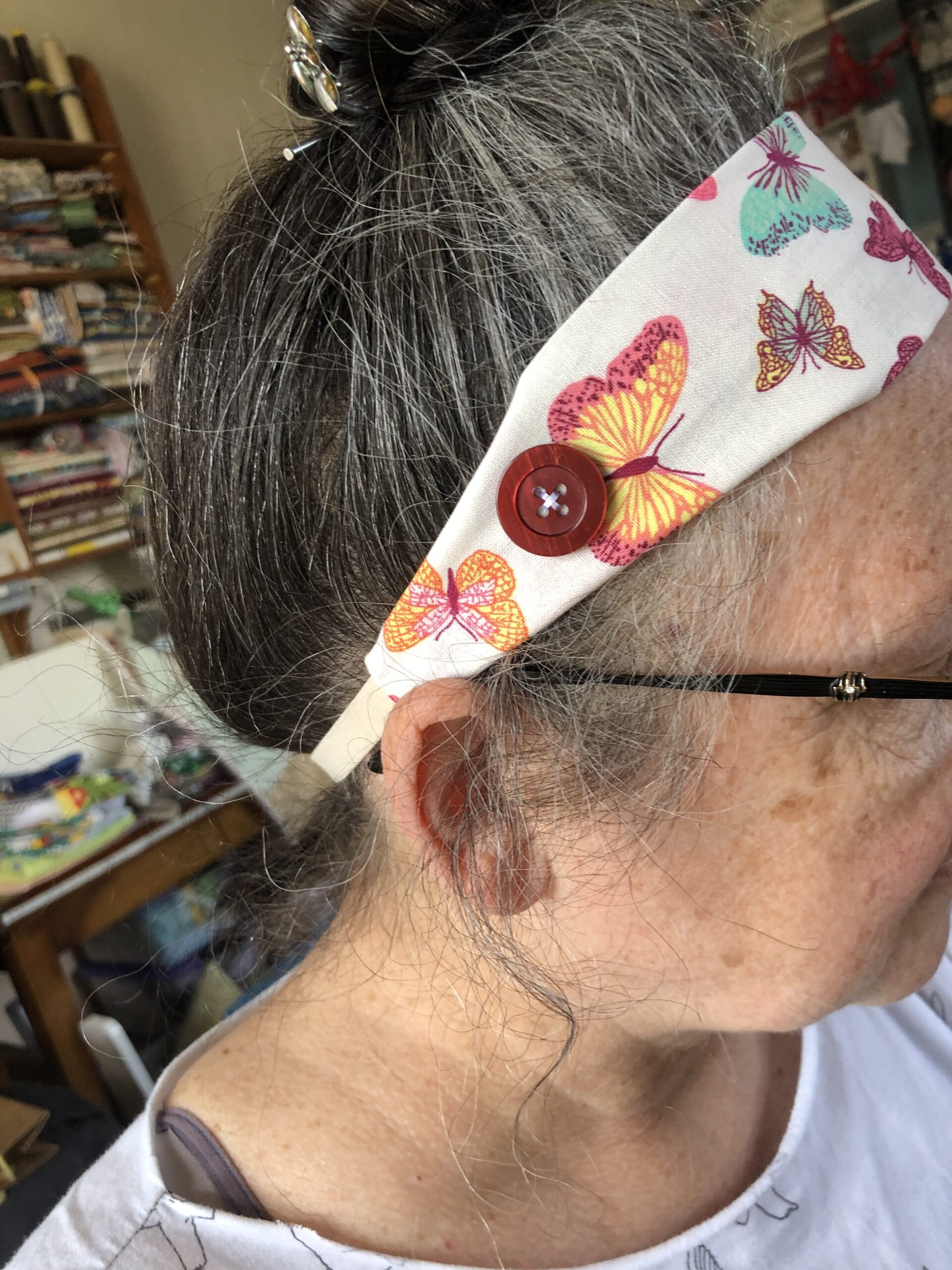 A person modelling a handmade headband for heroes